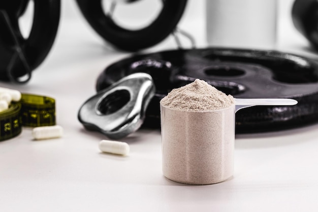 A product comparison shot showcasing different forms of creatine supplements (powder, pills, liquid), emphasizing that creatine monohydrate is the most studied and cost-effective option.