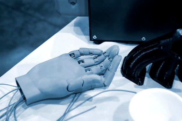 A 3D printer creating a custom-designed medical device, such as a prosthetic limb or a dental implant, with a doctor overseeing the process. The focus is on the customization and precision of the 3D printing technology.