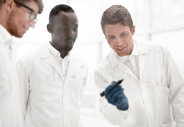 An image depicting the stages of drug development, from laboratory research to clinical trials, showing scientists in lab coats and doctors interacting with patients.