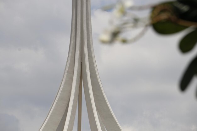 Close-up of the columns of the Palácio da Alvorada in Brasilia, capturing the unique design of Oscar Niemeyer and the play of light and shadow on the white concrete.